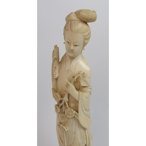 82 - A Chinese ivory figure of a lady