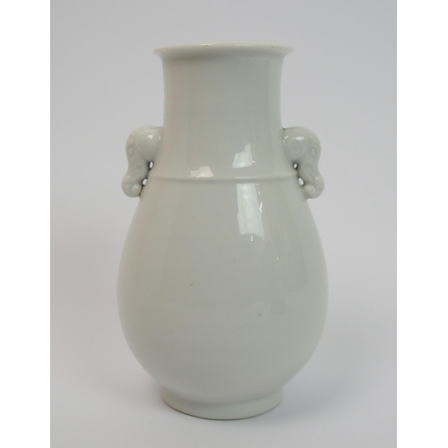 84 - A Chinese white ware baluster vase