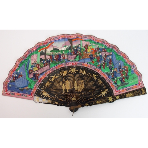 91 - A Chinese export black and gold double-sided lacquered fan