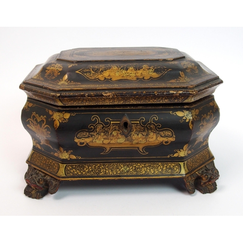 92 - A Chinese export black and gold lacquered octagonal shaped tea caddy