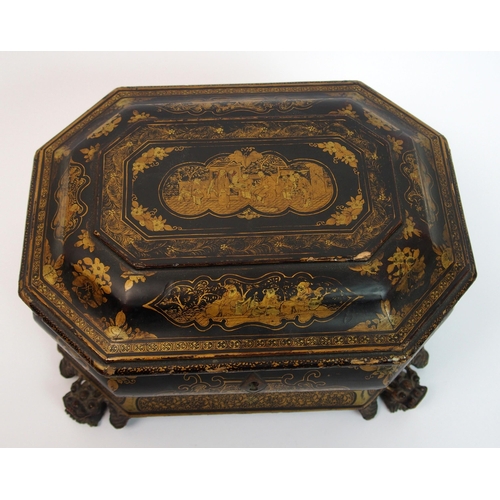 92 - A Chinese export black and gold lacquered octagonal shaped tea caddy