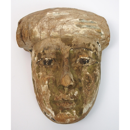 95 - An Egyptian painted wood sarcophagus mask