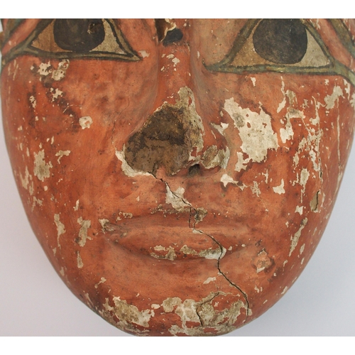 96 - An Egyptian painted wood sarcophagus mask