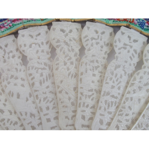 98 - A Chinese export ivory and gouache double-sided fan