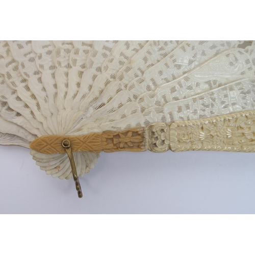 98 - A Chinese export ivory and gouache double-sided fan