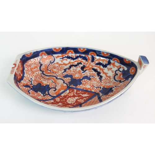 103 - An Imari boat shaped dish