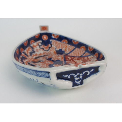 103 - An Imari boat shaped dish