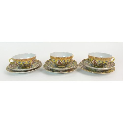 104 - Three Canton porcelain yellow ground teacups