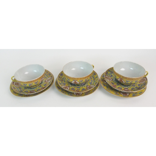 104 - Three Canton porcelain yellow ground teacups