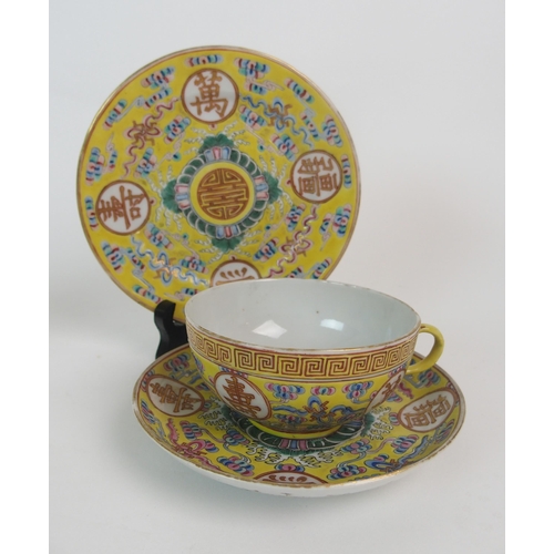 104 - Three Canton porcelain yellow ground teacups