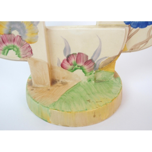 1057 - A Clarice Cliff Rhodanthe painted ceramic double candlestick