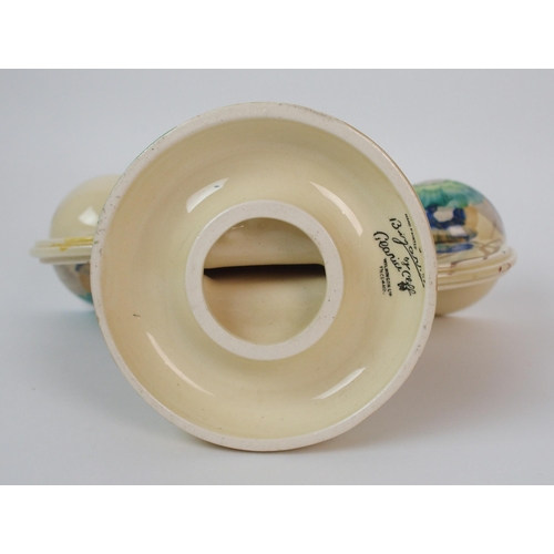 1057 - A Clarice Cliff Rhodanthe painted ceramic double candlestick