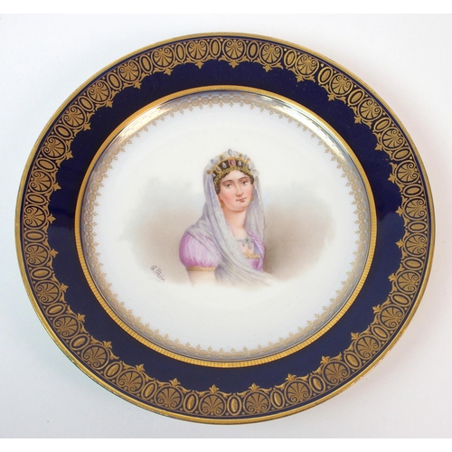 1060 - A pair of Sevres-style painted porcelain plates