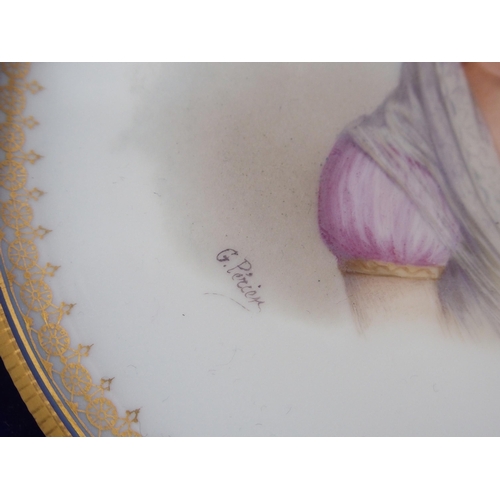 1060 - A pair of Sevres-style painted porcelain plates