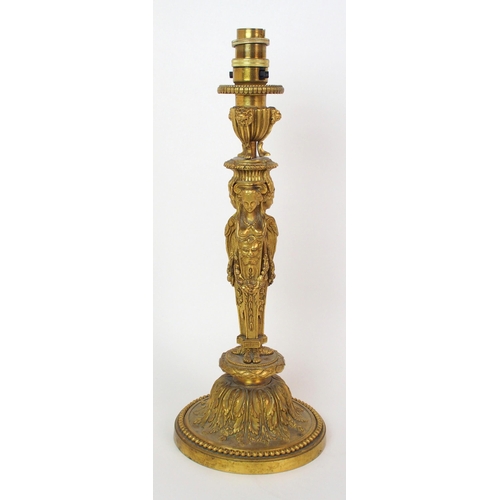 1061 - A French Empire-style gilt bronze table lamp