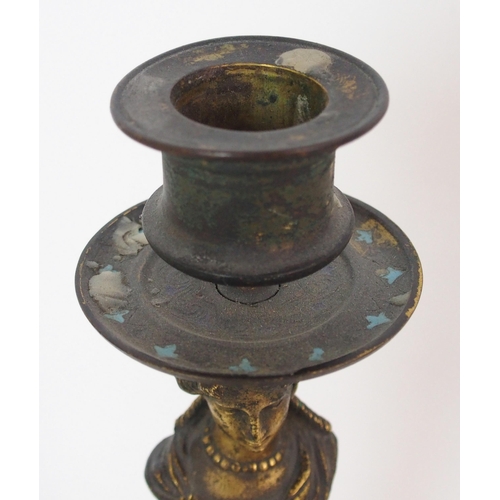 1062 - A pair of French champleve enamel and gilt bronze candlesticks