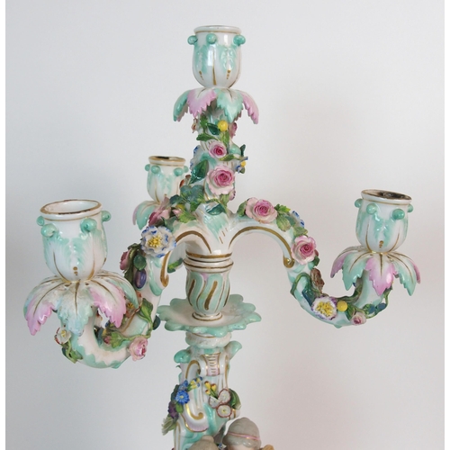 1063 - A pair of Meissen porcelain four-light candelabra