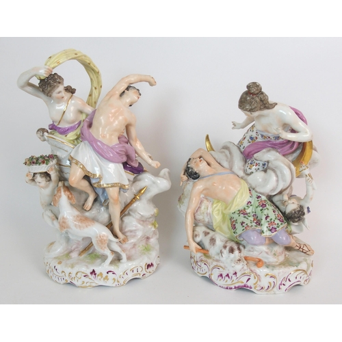 1064 - A pair of Continental porcelain figural groups and a Continental porcelain wall pocket