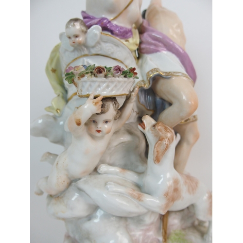 1064 - A pair of Continental porcelain figural groups and a Continental porcelain wall pocket