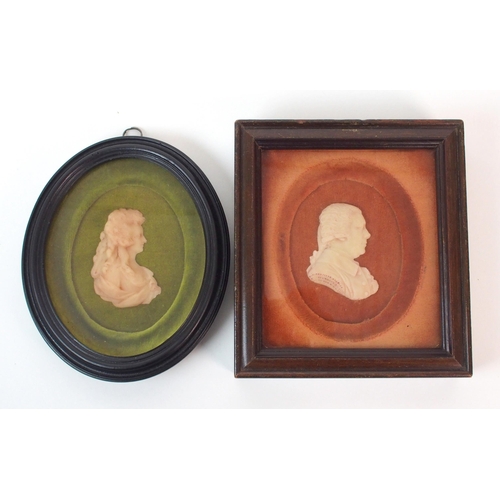 1066 - Two Continental framed carved wax portraits in profile