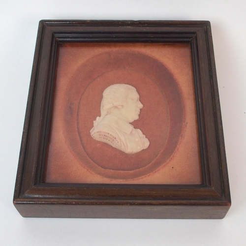 1066 - Two Continental framed carved wax portraits in profile