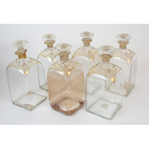 1075 - An English Regency decanter set in mahogany case