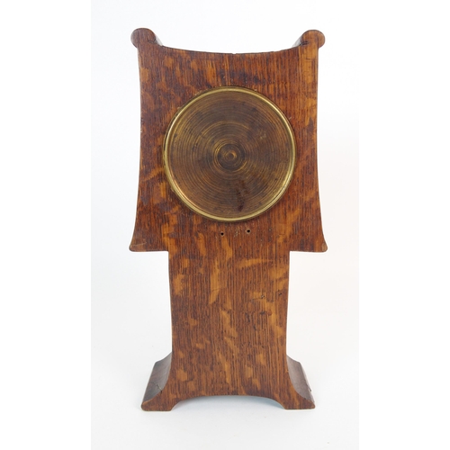 1076 - An Arts and Crafts oak mantle clock