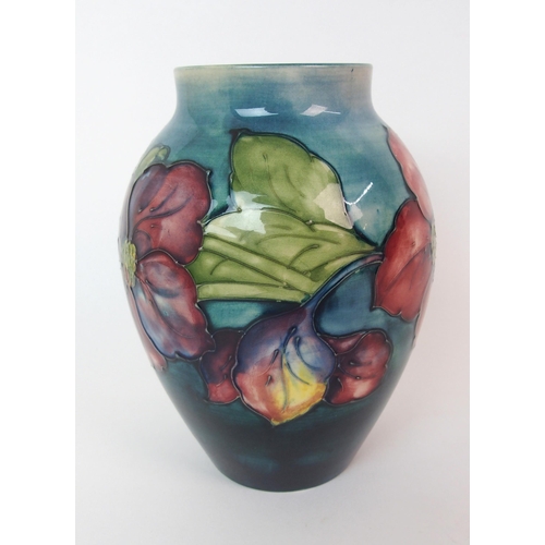 1077 - A Moorcroft Pottery Clematis vase