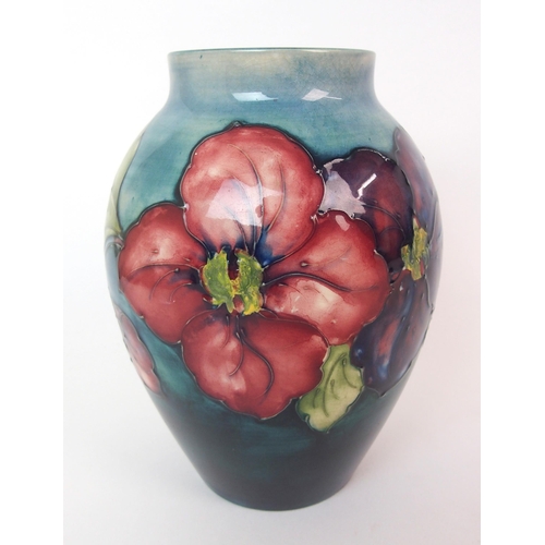 1077 - A Moorcroft Pottery Clematis vase