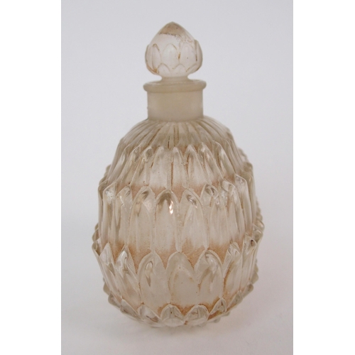 1080 - A Rene Lalique moulded glass Amelie perfume with sepia patina