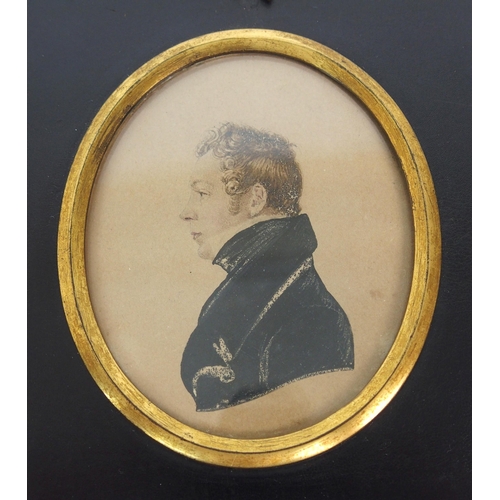 1094 - A pair of miniature portraits in profile and a miniature portrait of a gentleman