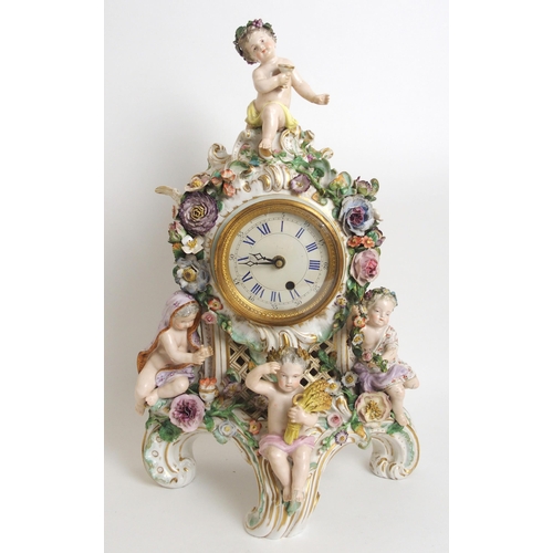 1099 - A Meissen-style figural porcelain mantle clock