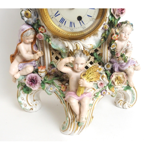 1099 - A Meissen-style figural porcelain mantle clock