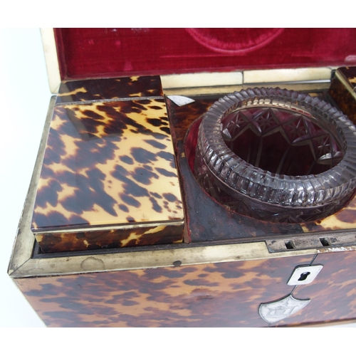 1104 - An English Regency tortoiseshell tea caddy