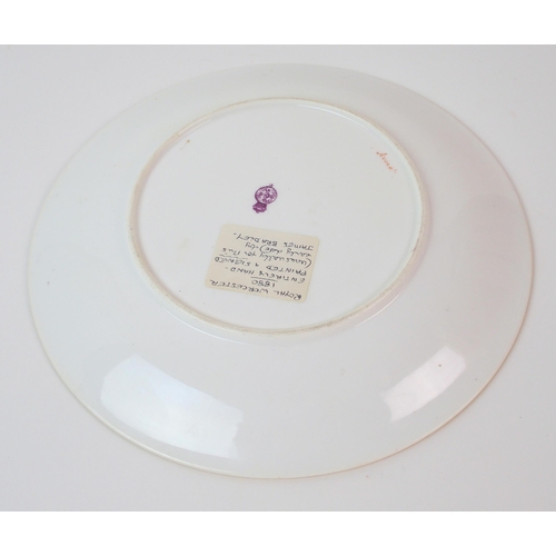 1117 - A Royal Worcester painted plate by James Bradley