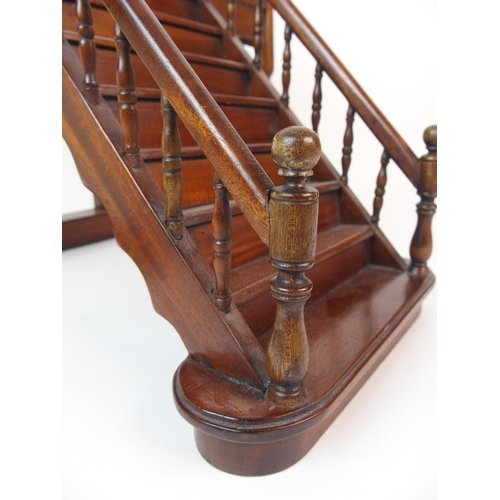 1121 - A mahogany apprentice model of a staircase