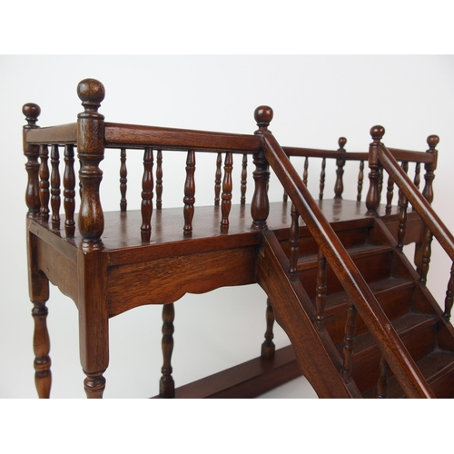 1121 - A mahogany apprentice model of a staircase