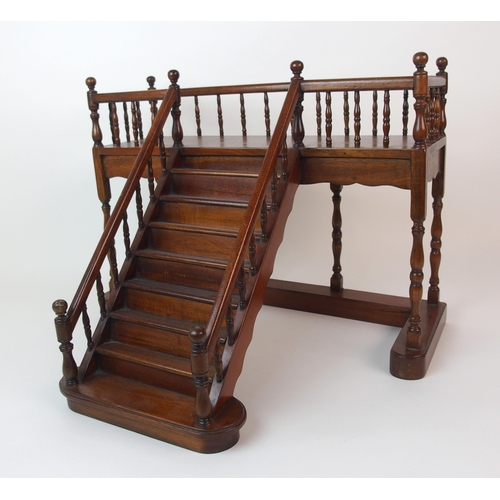 1121 - A mahogany apprentice model of a staircase