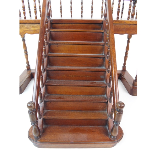 1121 - A mahogany apprentice model of a staircase