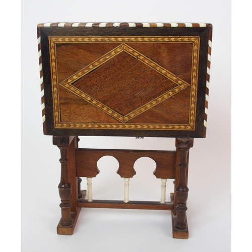 1122 - A Moroccan-style mahogany and fruitwood inlaid miniature cabinet