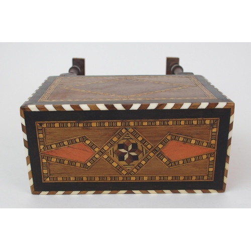 1122 - A Moroccan-style mahogany and fruitwood inlaid miniature cabinet