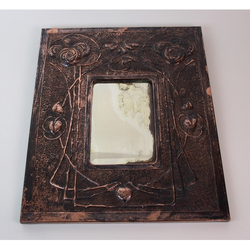 1126 - An Arts and Crafts copper mirror