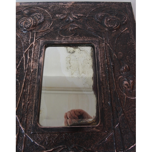 1126 - An Arts and Crafts copper mirror