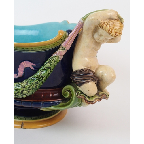 1128 - A Minton Majolica figural jardiniere