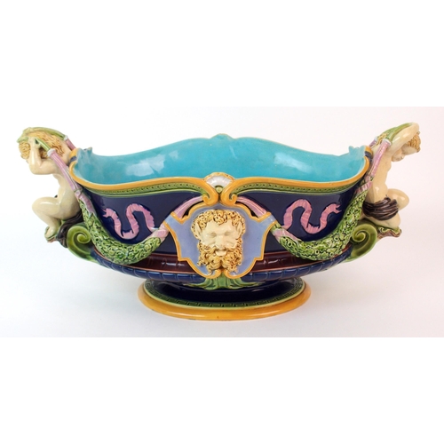 1128 - A Minton Majolica figural jardiniere