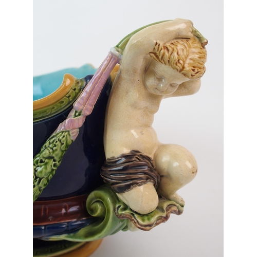 1128 - A Minton Majolica figural jardiniere