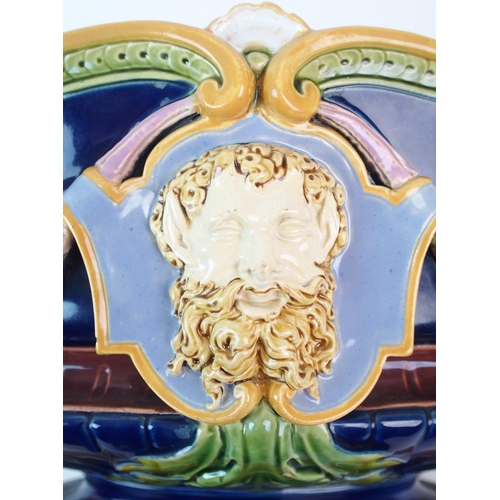 1128 - A Minton Majolica figural jardiniere