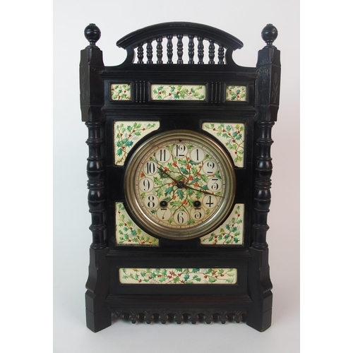 1152 - An Arts & Crafts ebonised wood bracket clock