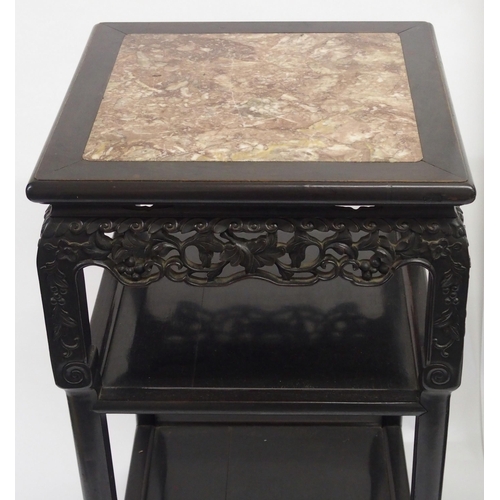 35 - A pair of Chinese hardwood pedestals with inset marble tops