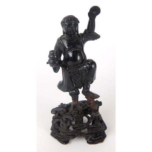 41 - A Chinese bronze figure of a man